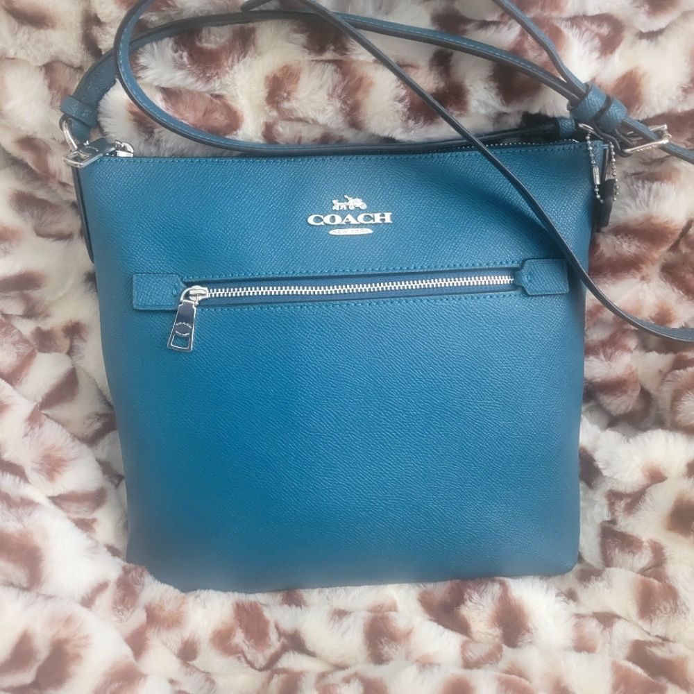 Coach **Authentic**Teal Rowan Crossbody bag w/Adjustable strap.